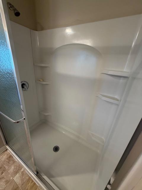 Shower pan, limescale lifted — after cleaning