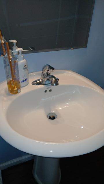Basin, water marks off — after cleaning
