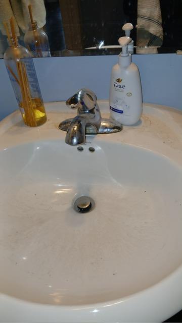 Basin, water marks off — before cleaning