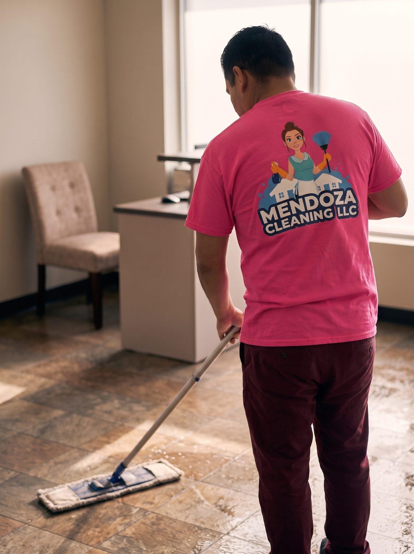 Mopping the floor of a commercial reception area